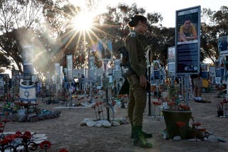 People gather at the former site of the Nova music festival to commemorate the second anniversary of 7 October attack